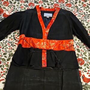 Wilsons Leather Black Jacket with Red Floral Accents